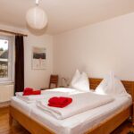 Ferienwohnung Feldblick – Schlafzimmer mit Doppelbett